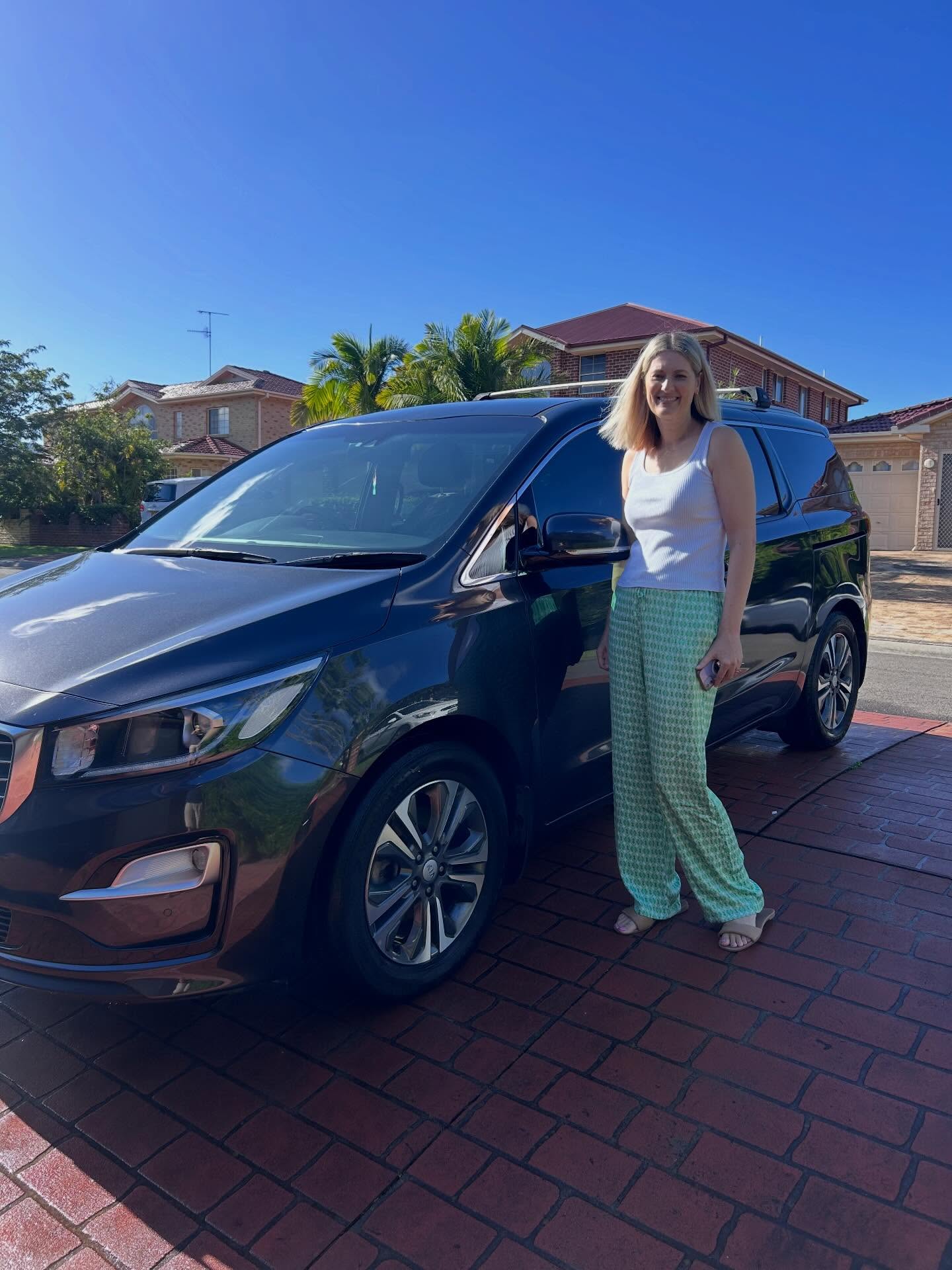 Happy customer with freshly detailed white Audi Q3